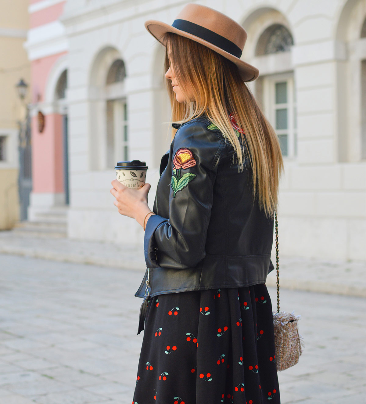 woman-with-hat-and-leather-jacket