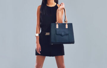 woman-holding-black-bag