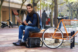 men-model-in-park-with-bike